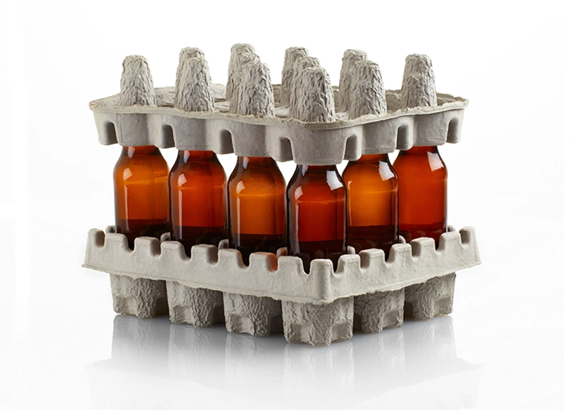 Brown bottles enclosed in molded fiber end cap products